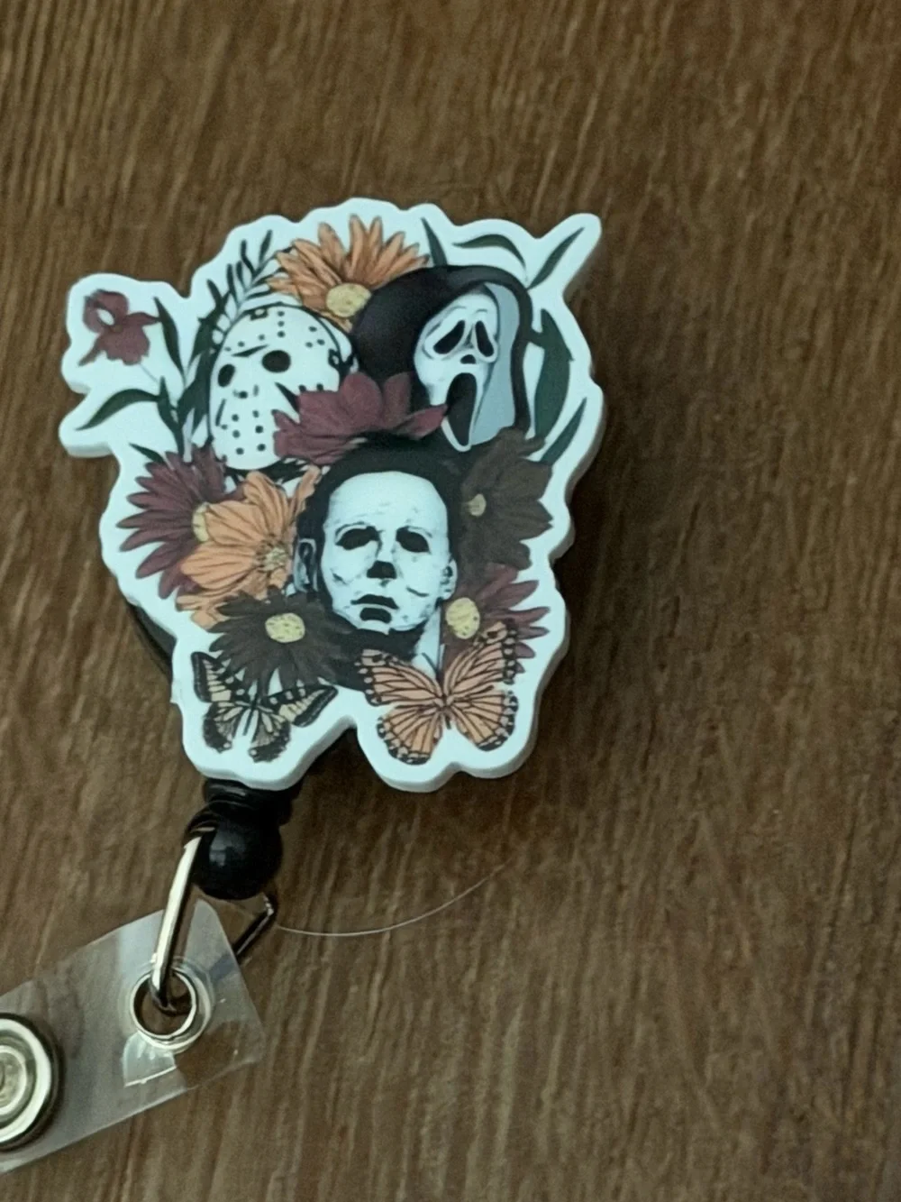 Horror Mask Floral Badge Reel - Black, White, Brown, Orange